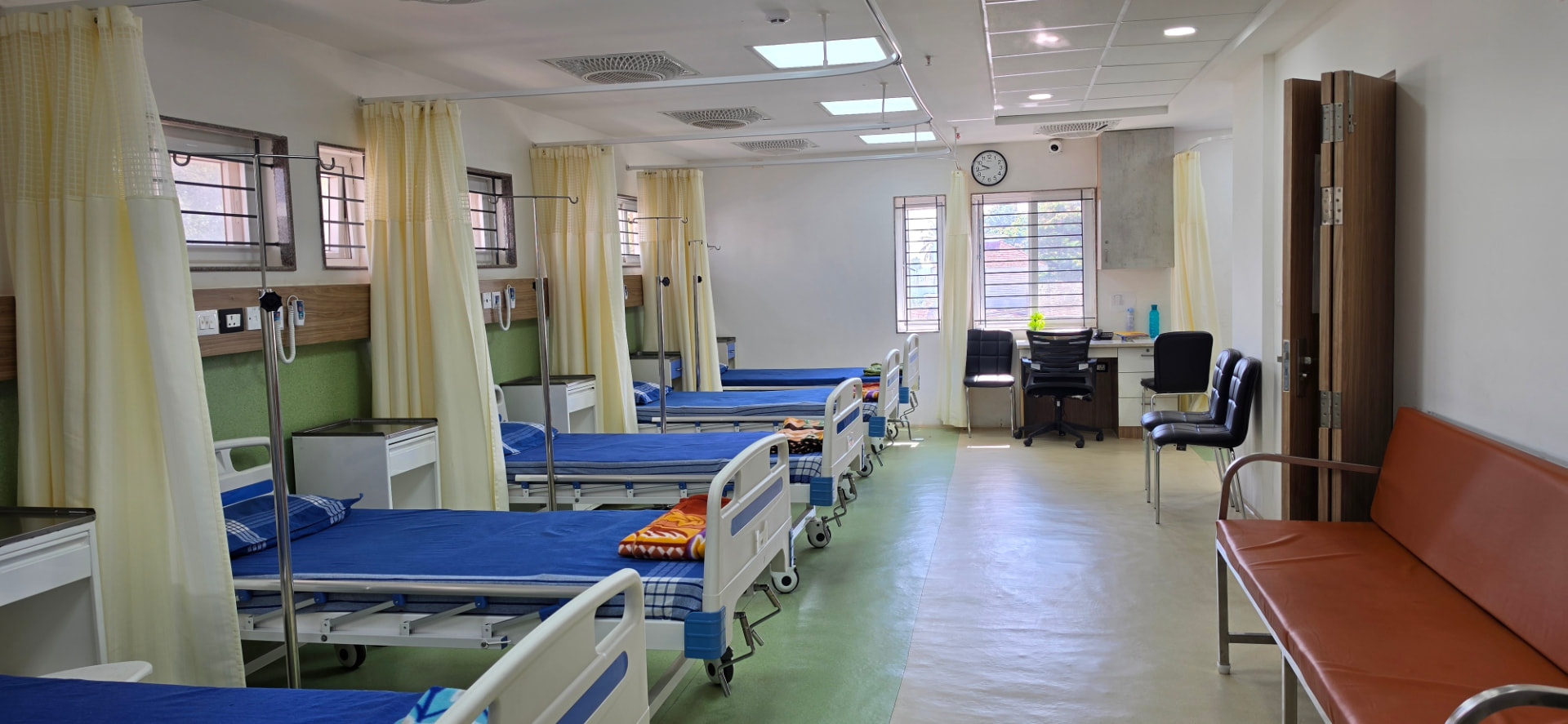 Ward beds with nursing station and seating for attenders